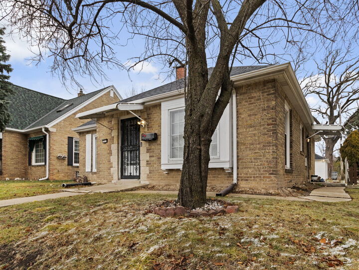 Property Photo:  7018 W Hampton Ave  WI 53218 