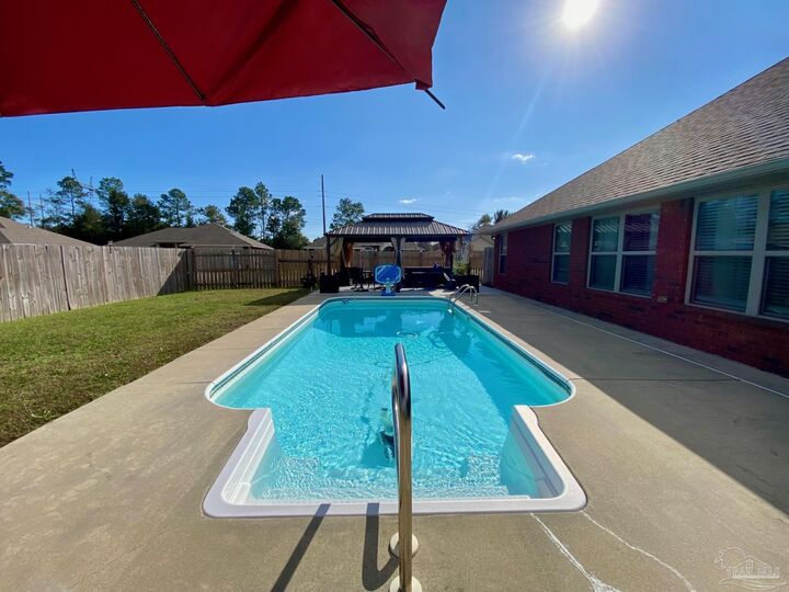 Property Photo:  6085 Winchester Cir  FL 32570 