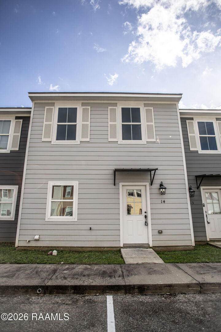 Property Photo:  14 Townhouse Cove  LA 70506 