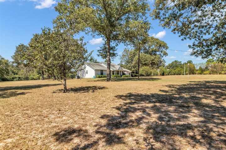 Property Photo: 13833 N Highway 75 TX 77378