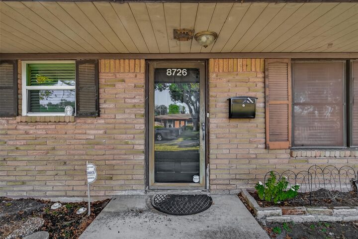 Property Photo:  8726 Glenloch Drive  TX 77061 