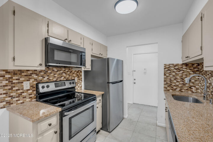 Property Photo:  55 Amberly Drive G  NJ 07726 