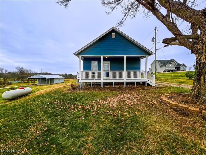 Property Photo: 3895 Adamsville Road OH 43701