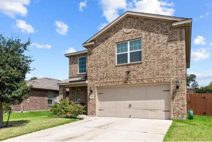 Property Photo: 8715 Nicoli Creek Drive TX 77338