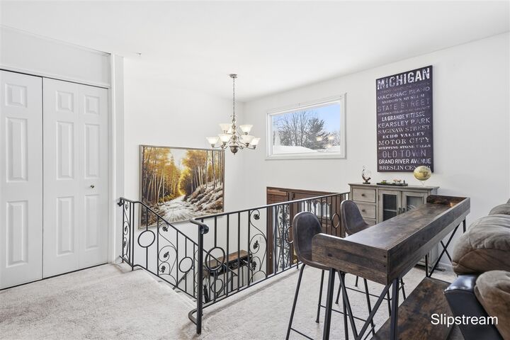 Property Photo:  1706 Autumn Lane  MI 48912-4504 