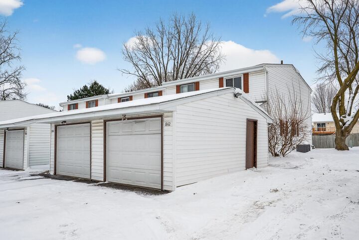 Property Photo:  842 Woodgate Drive 211  MN 55127 