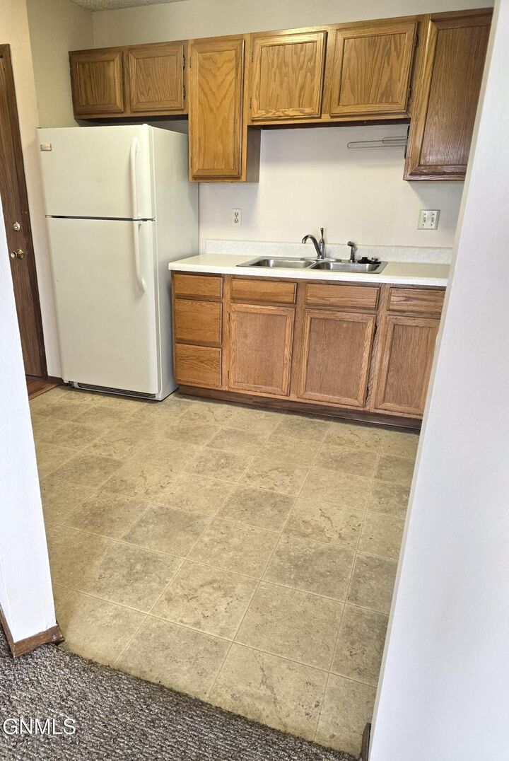 Property Photo: 1112 Portland Drive 301 ND 58504