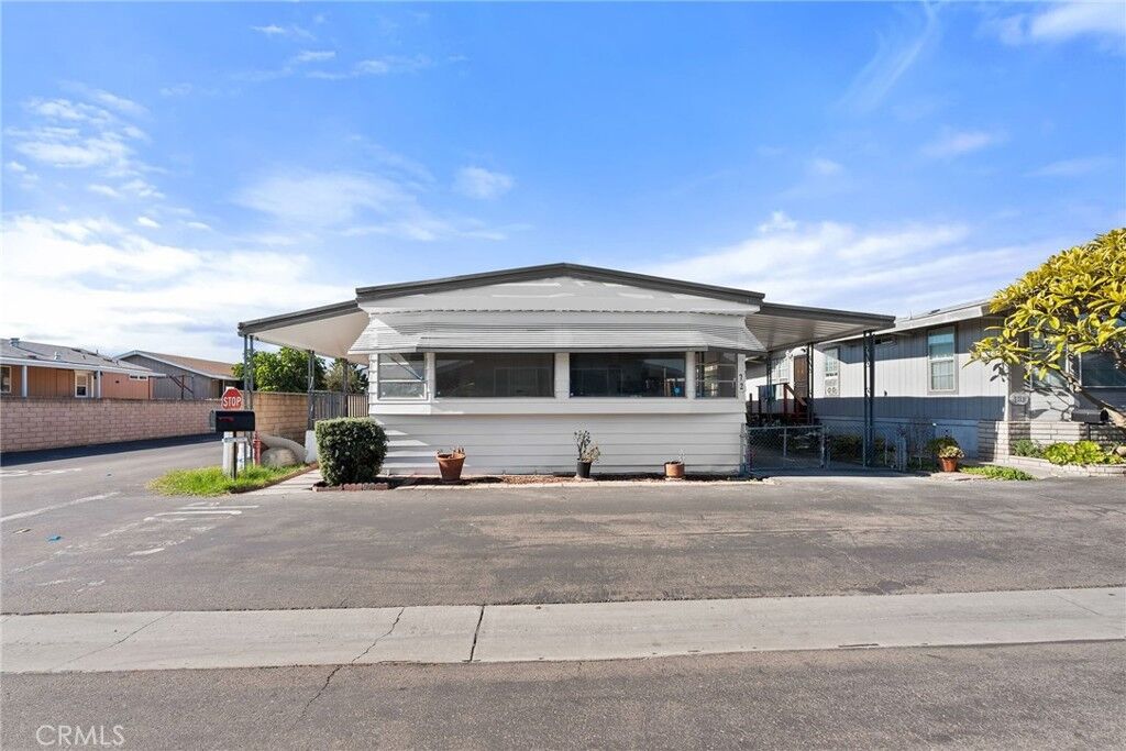 Property Photo:  9080 Bloomfield Avenue 72  CA 90630 
