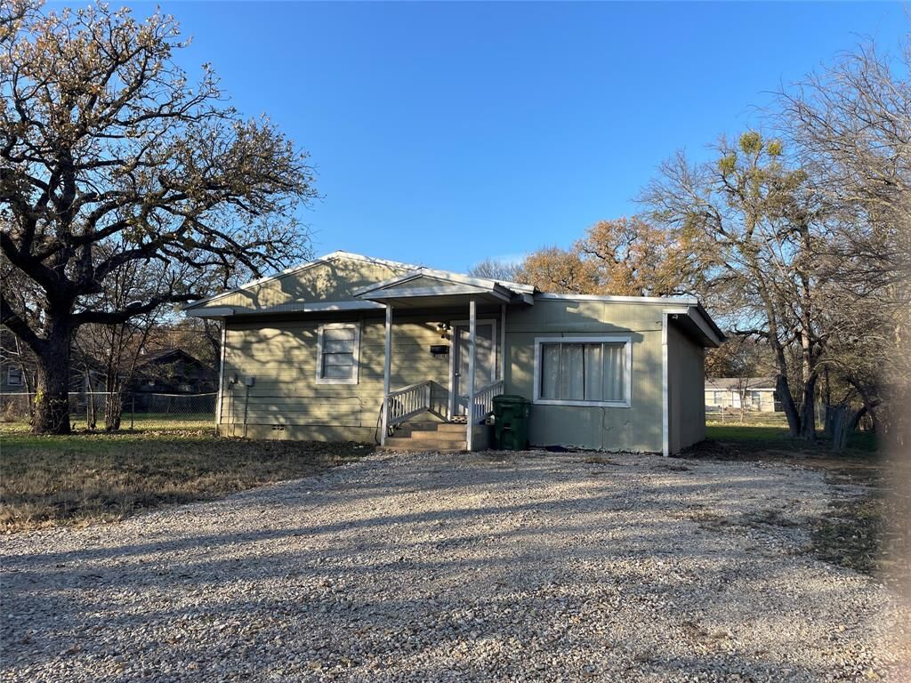 Property Photo:  300 NW 13th Street  TX 76067 