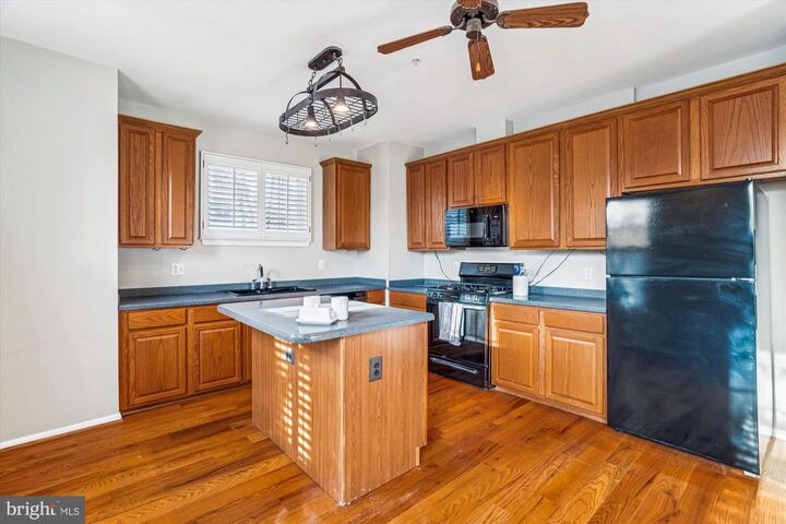 Property Photo:  15610 Everglade Lane E202  MD 20716 