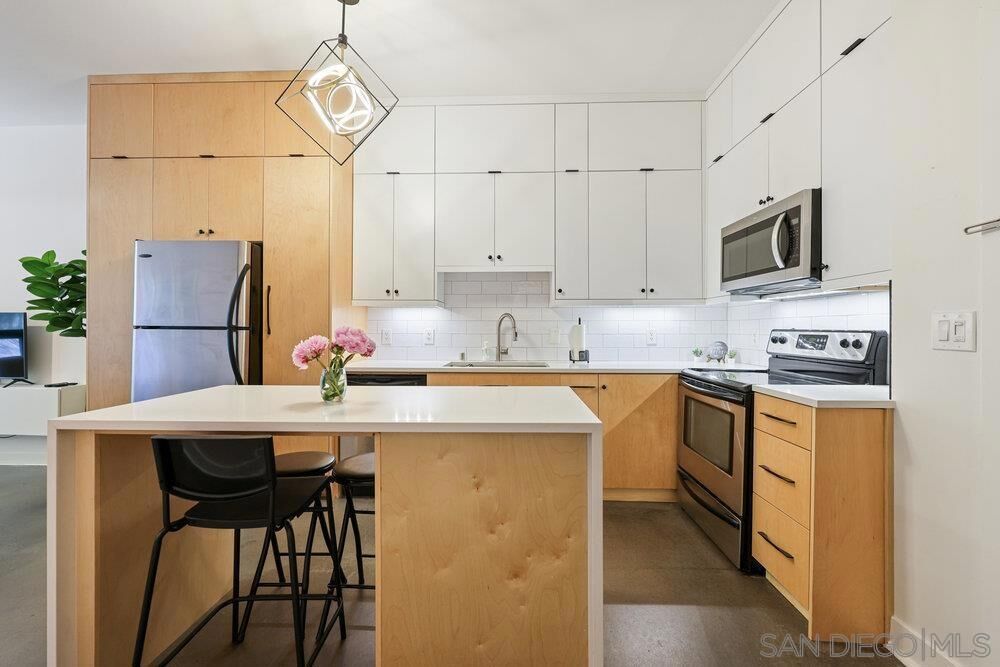 Property Photo:  889 Date St. 103  CA 92101 