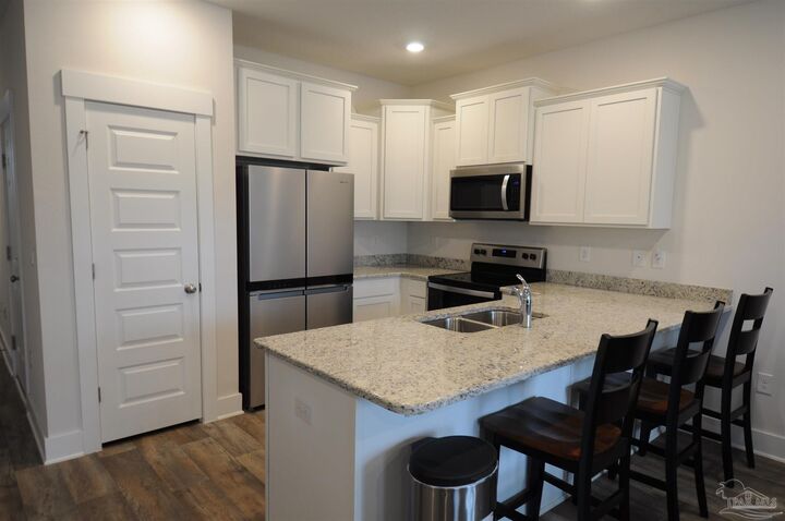 Property Photo:  8908 Brigade Trl  FL 32534 