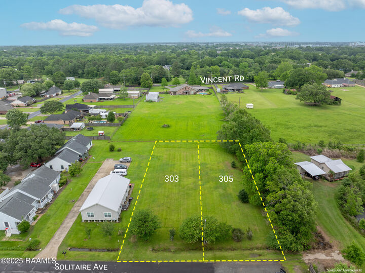 Property Photo:  303 Solitaire Avenue  LA 70508 