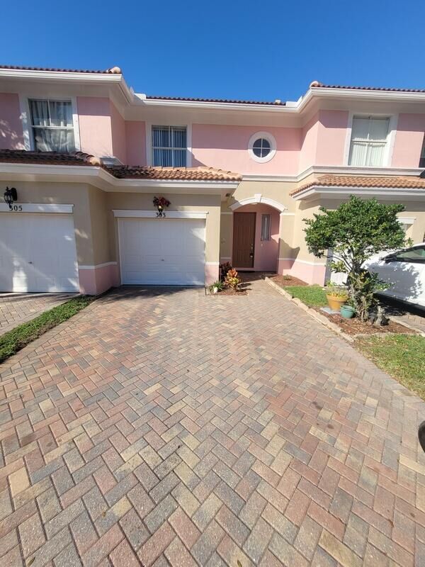 Property Photo:  303 Seminole Palms Drive  FL 33463 
