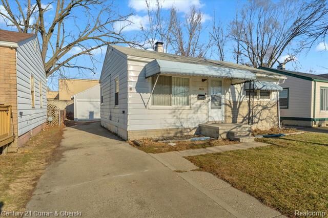 Property Photo:  7011 Lozier Avenue  MI 48091 