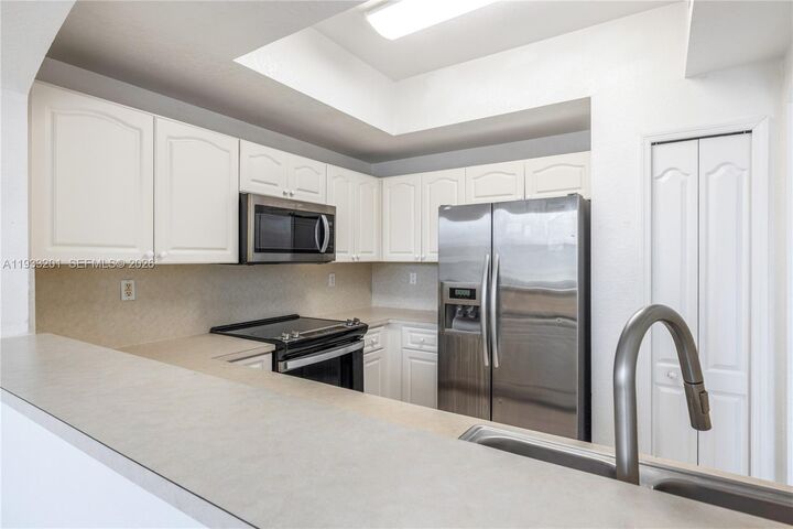 Property Photo:  8854 W Flagler St 210  FL 33174 