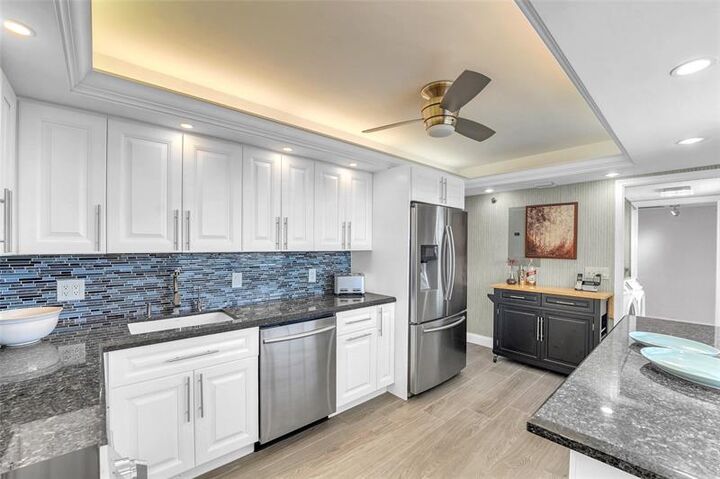 Property Photo:  4015 W Palm Aire Dr 703  FL 33069 