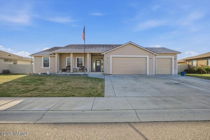 Property Photo:  6304 Turf Paradise Dr  WA 99301 