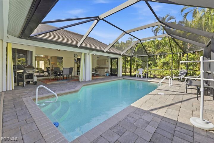 Property Photo:  9718 Caloosa Yacht And Racquet Club Drive  FL 33919 