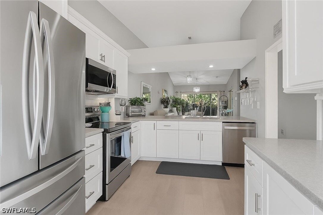 Property Photo:  1635 Windy Pines Drive 2408  FL 34112 