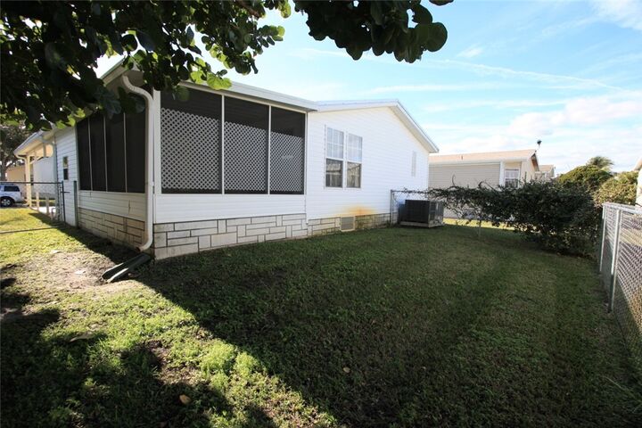 Property Photo:  318 Macadamia Drive  FL 32976 