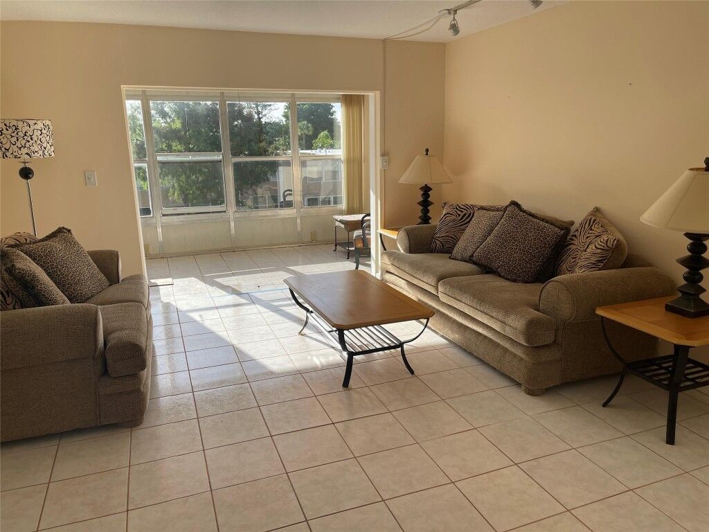 Property Photo: 1025 Country Club Drive 301 FL 33063