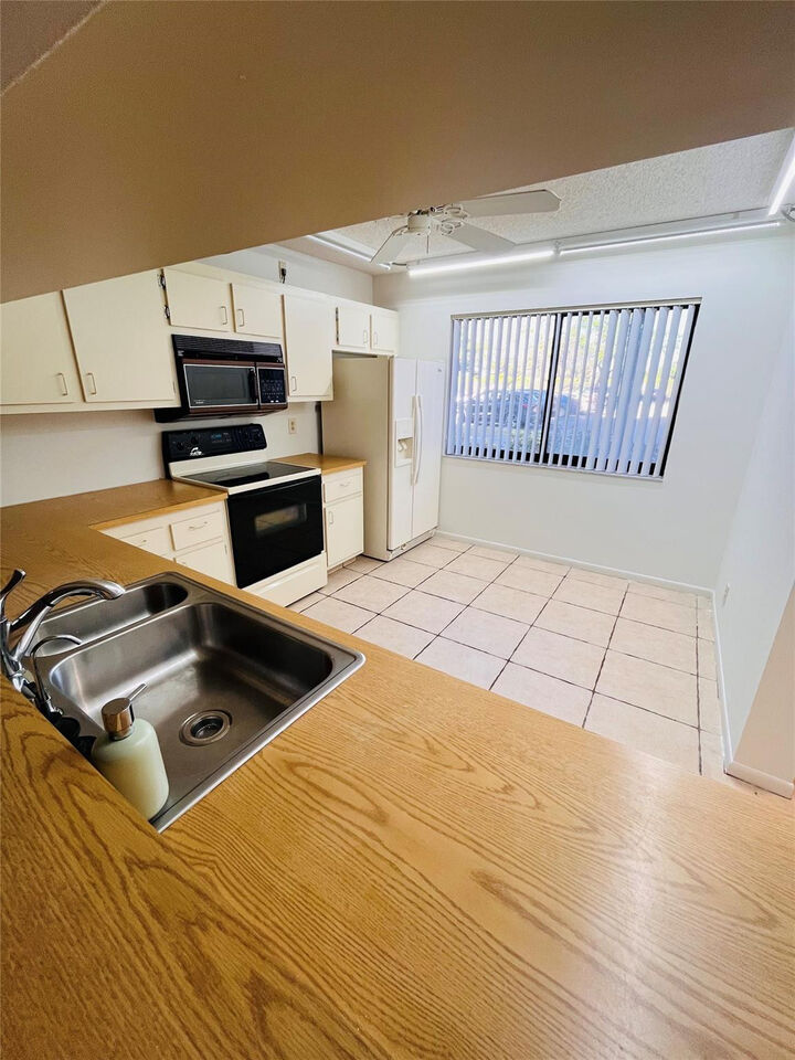 Property Photo:  8020 Hampton Boulevard 102  FL 33068 