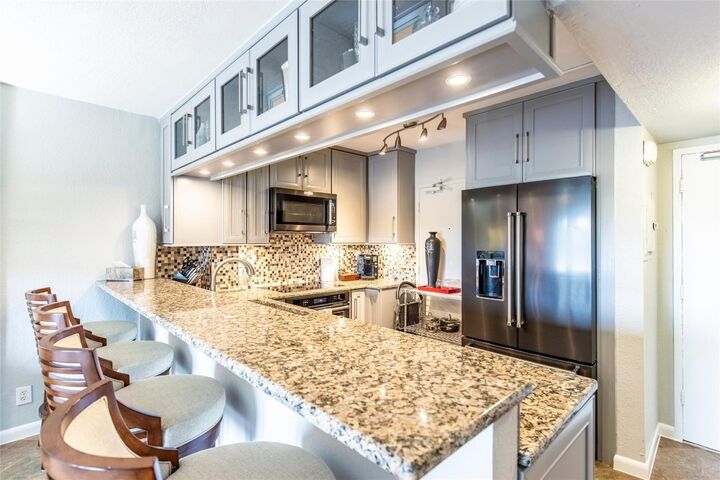 Property Photo:  1831 NE 38th Street 206  FL 33308 