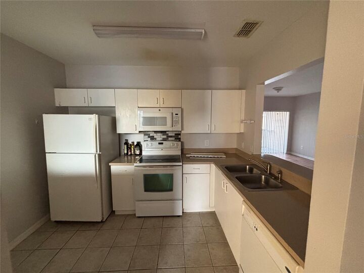 Property Photo:  533 Villa Del Sol Circle 202  FL 32824 