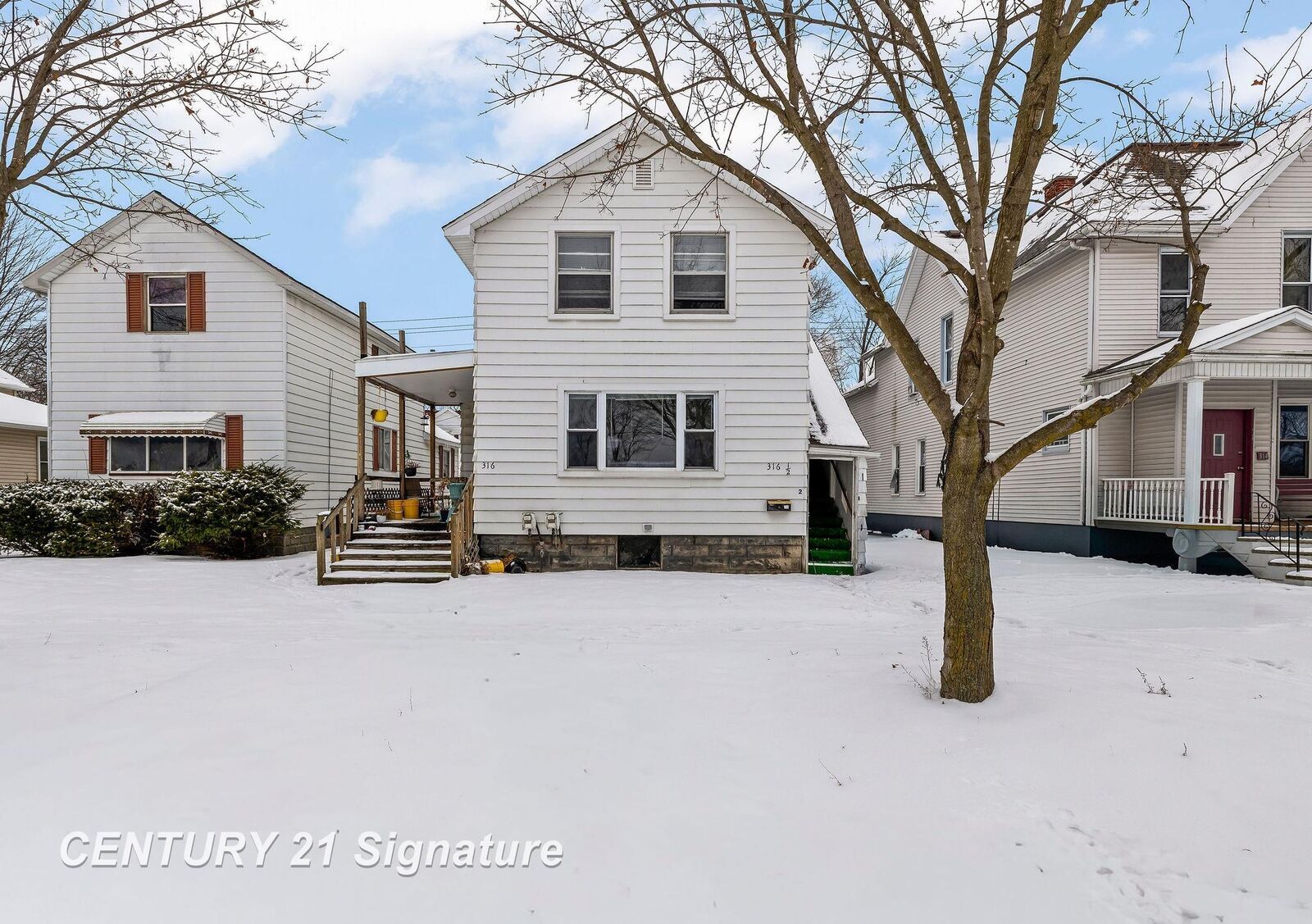 Property Photo:  316 N Jackson Street  MI 48708 