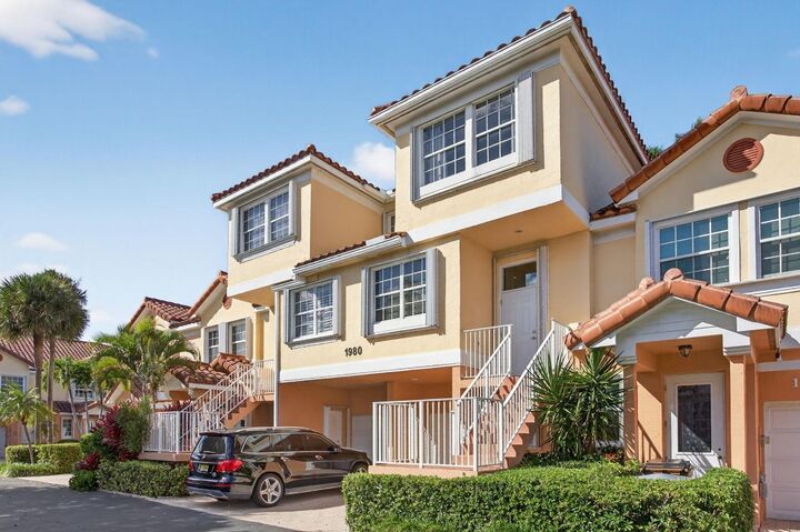 Property Photo:  1980 NE 7th Street 104  FL 33441 