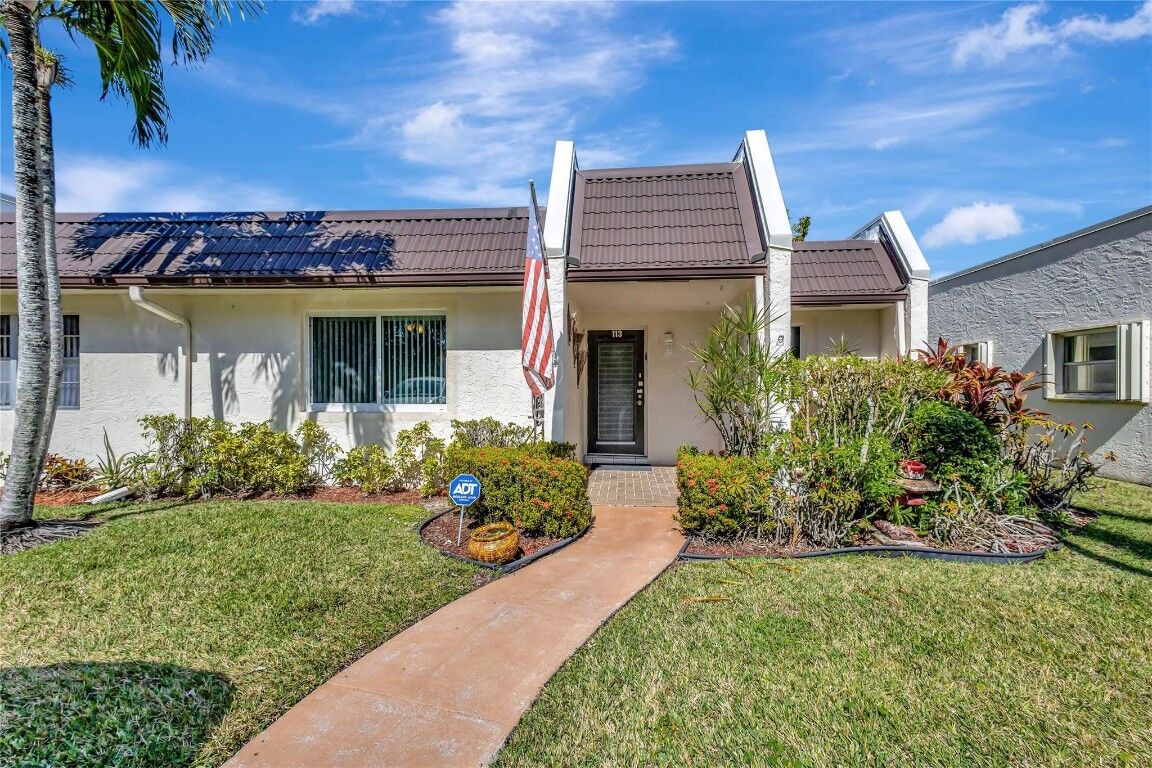 Property Photo:  113 Lake Susan Drive 113  FL 33411 