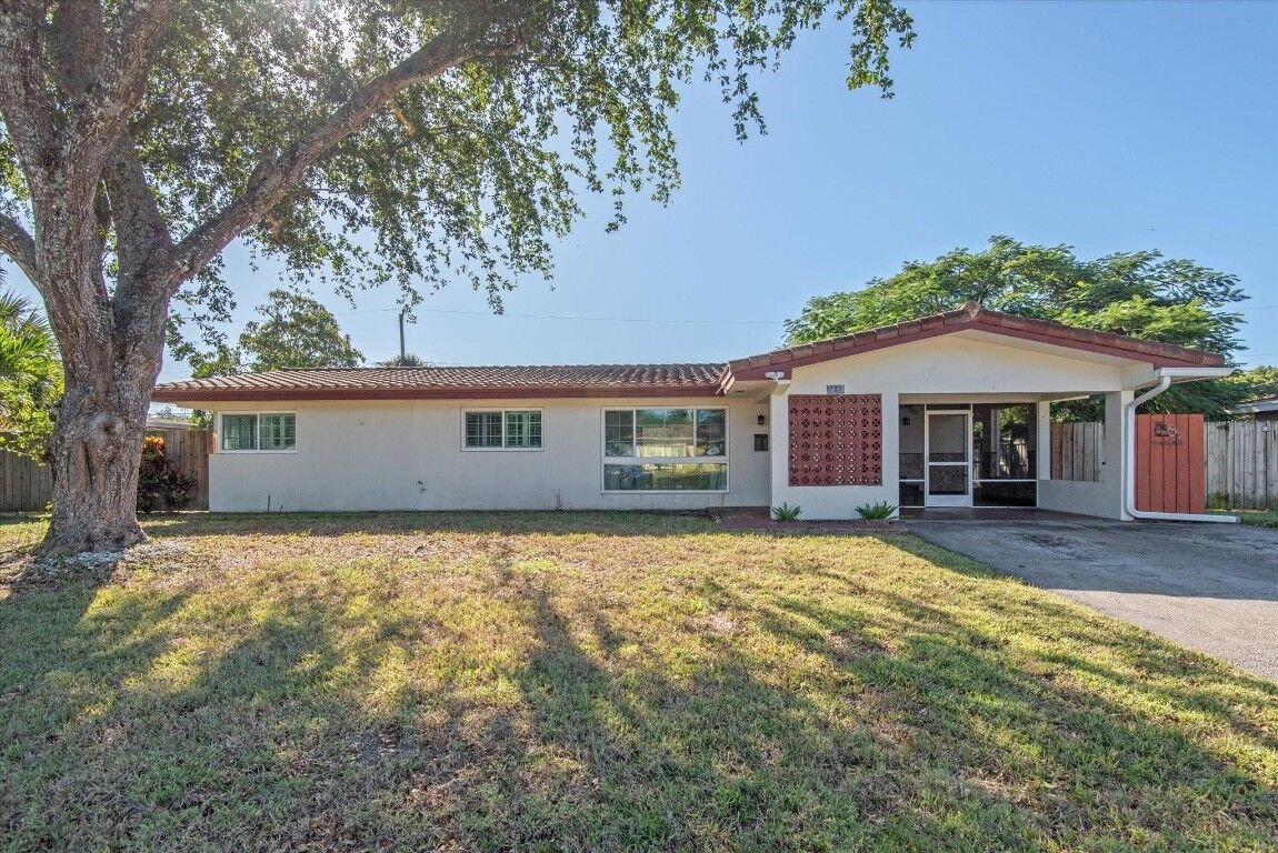 Property Photo:  5692 SW 1st Street  FL 33317 