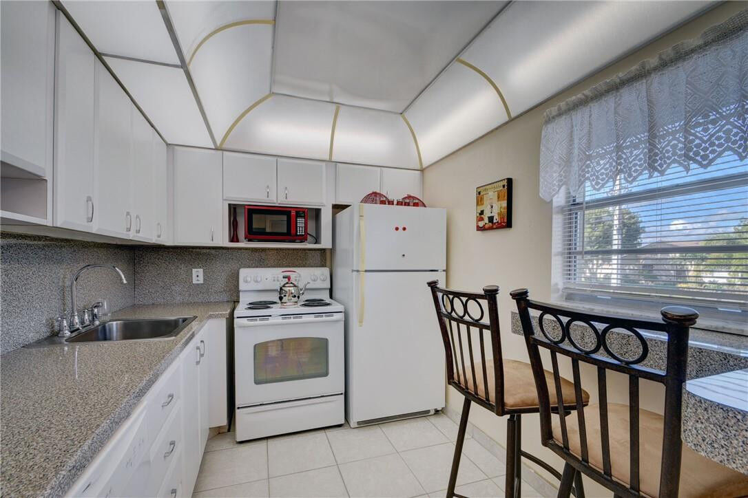 Property Photo: 330 NE 26th Avenue 207 FL 33435