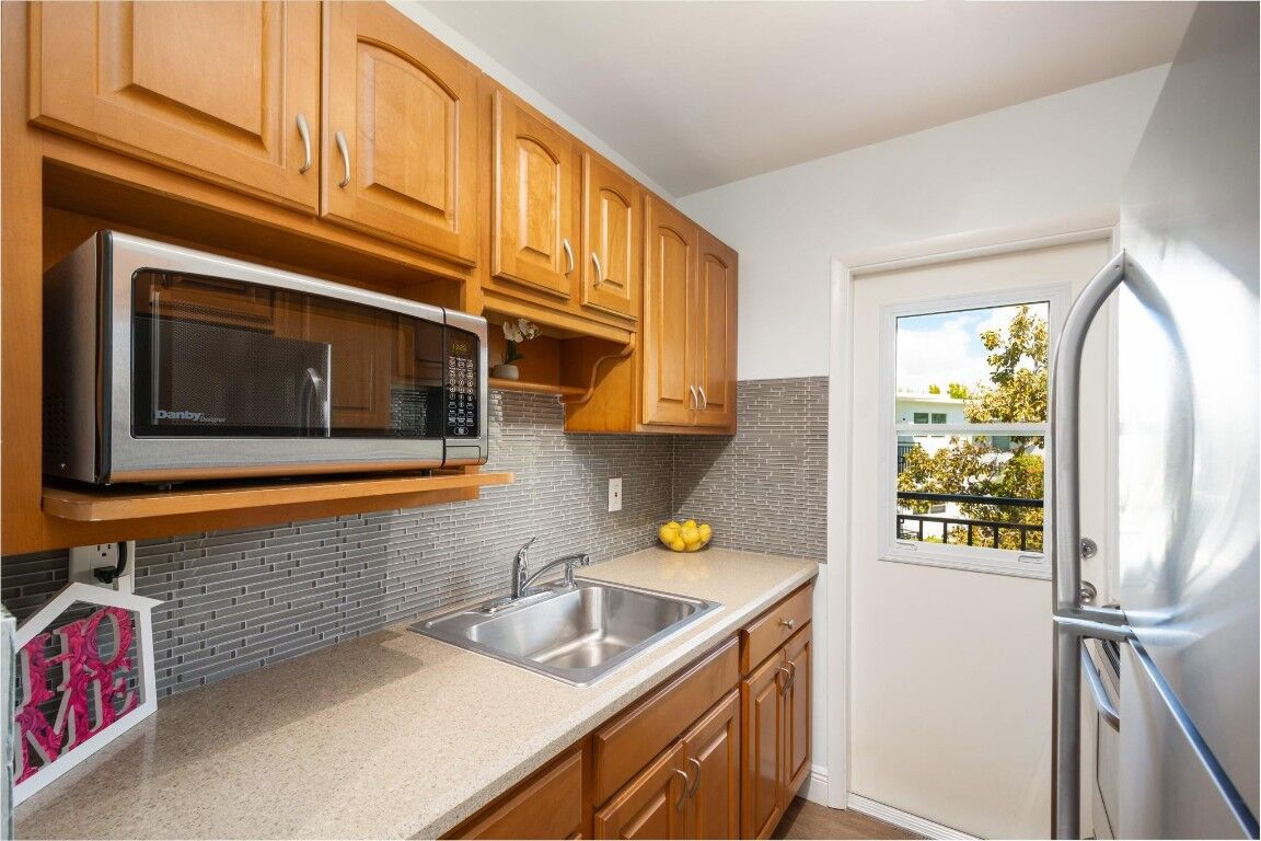 Property Photo:  1055 SE 15th Street 14C  FL 33316 