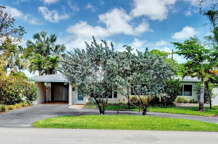 Property Photo:  81 NW 37th Street  FL 33309 