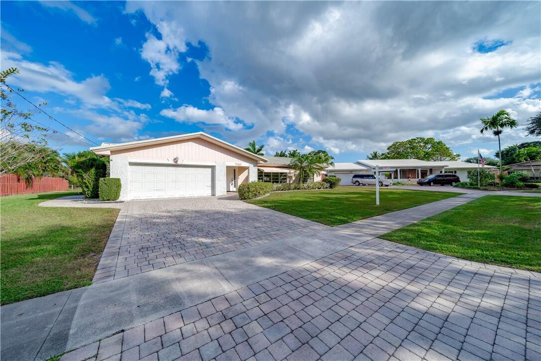 Property Photo:  760 NW 72nd Avenue  FL 33317 