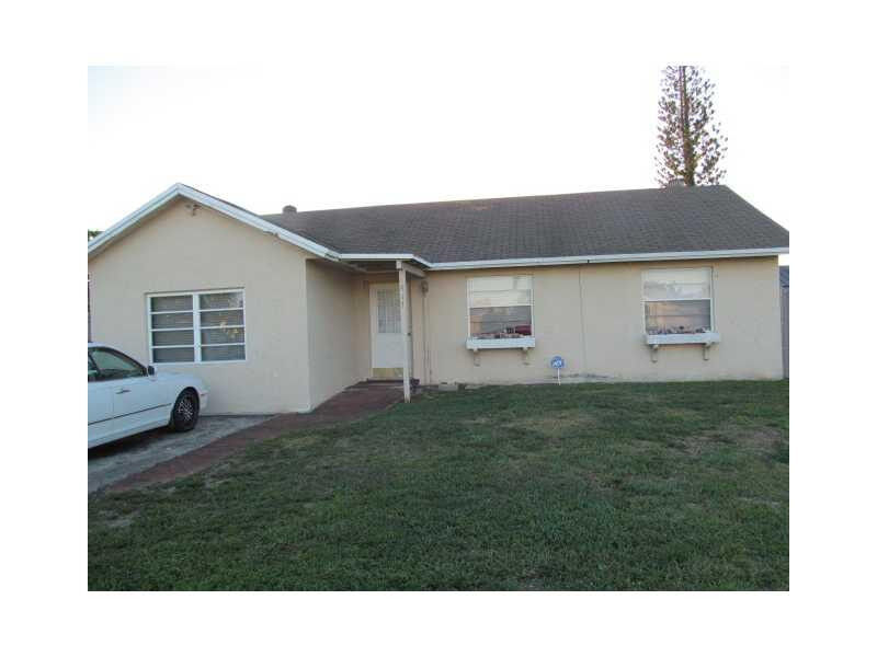 Property Photo:  417 SW Av  FL 33068 