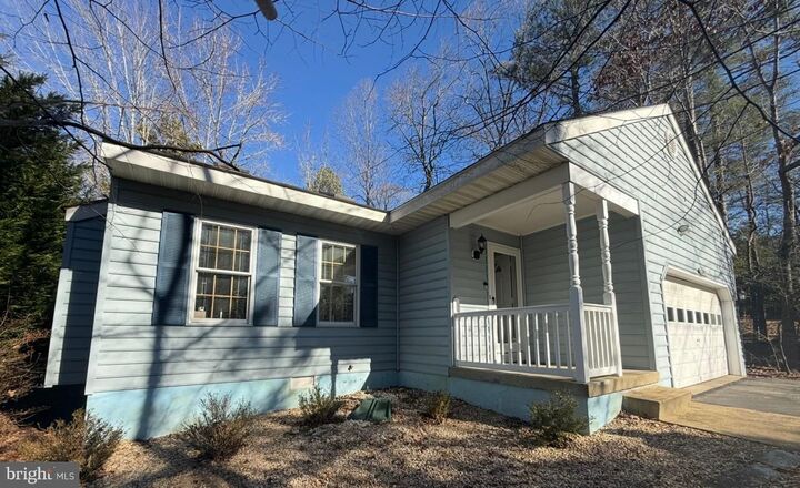 Property Photo:  22976 Sycamore Hollow Drive  MD 20619 