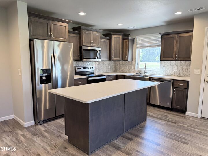 Property Photo:  3304 Kenner Loop  ND 58504 