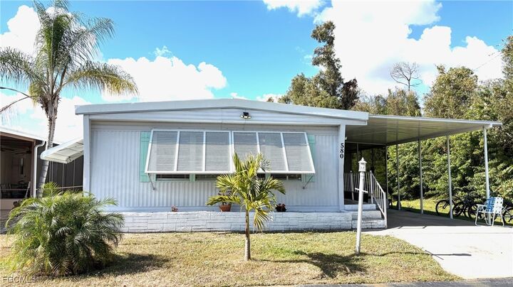 Property Photo:  580 Winning Way  FL 33917 