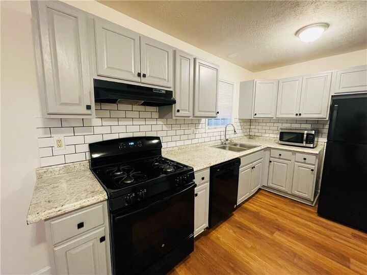 Property Photo:  2493 Washington Street Extension  GA 30106 