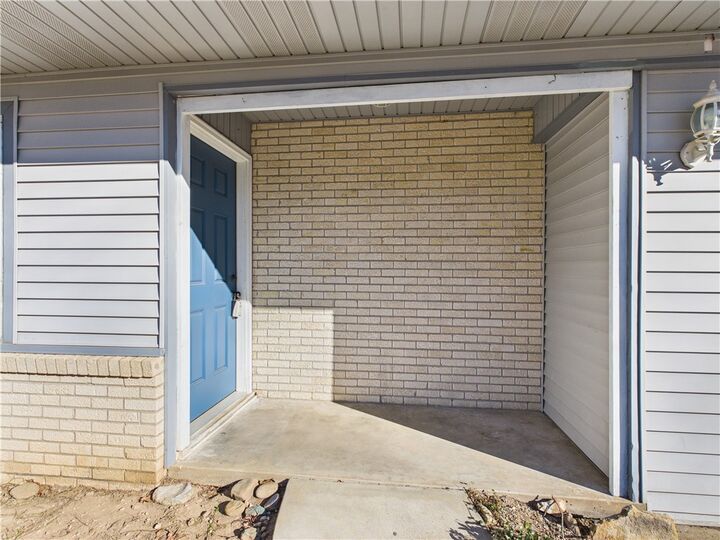 Property Photo:  611 Tamarind Street  AR 72601 