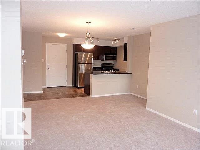Property Photo:  11816 22 Avenue SW 205  AB T6W 2A2 