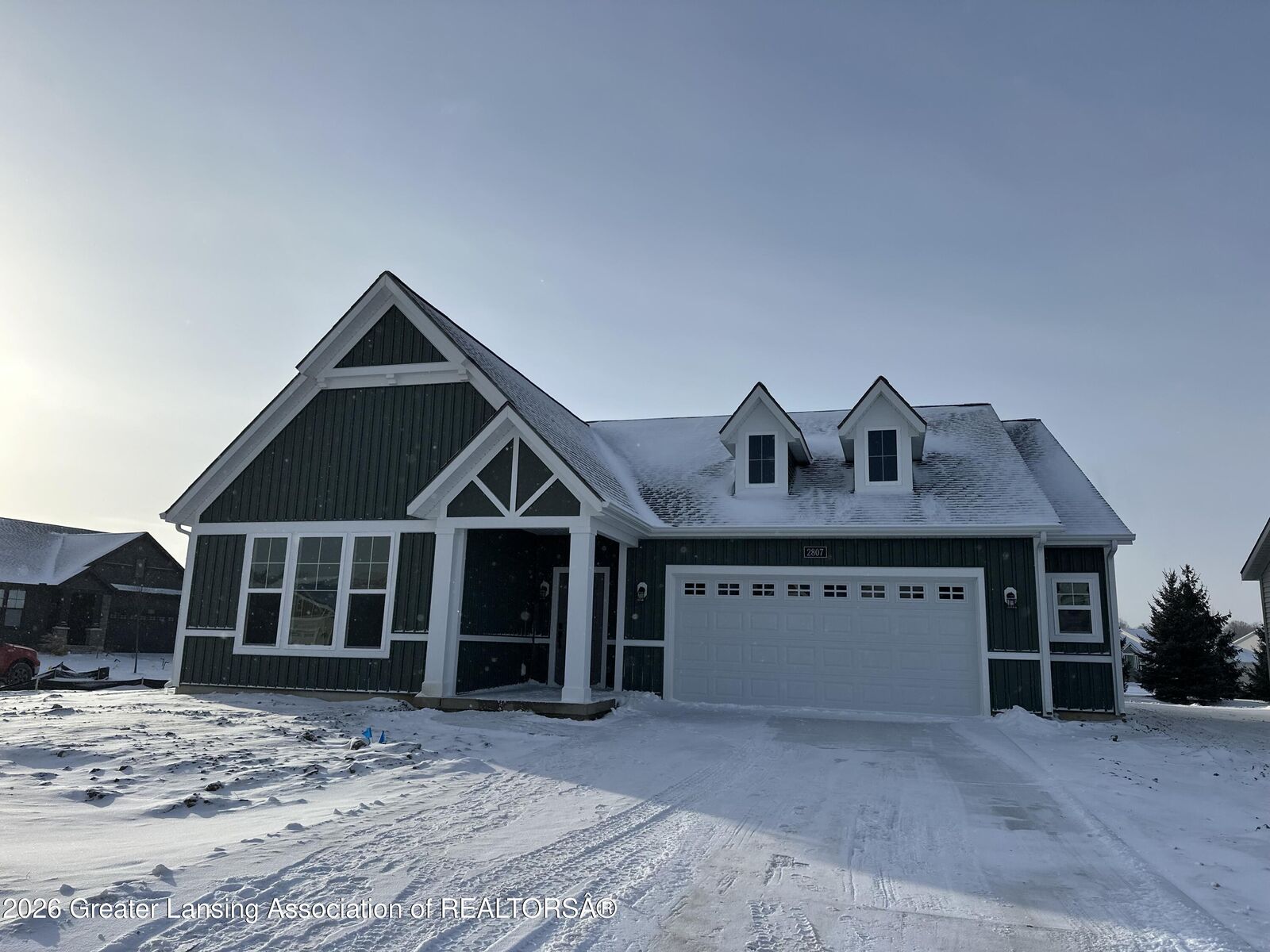 Property Photo:  2807 Carnoustie Drive  MI 48864 