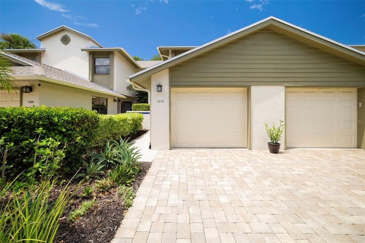 Property Photo: 1678 Starling Drive 102 FL 34231