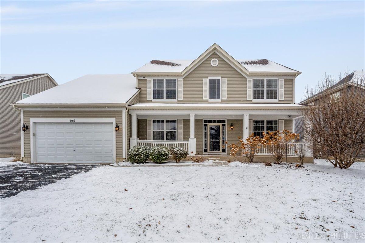 Property Photo:  706 Versailles Parkway  IL 60543 