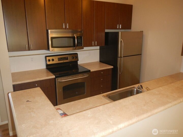 Property Photo:  16101  Bothell Everett Hwy C302  WA 98012 