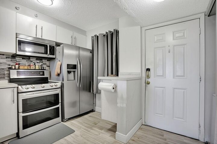 Property Photo:  2216 N Cypress Bend Drive 501  FL 33069 