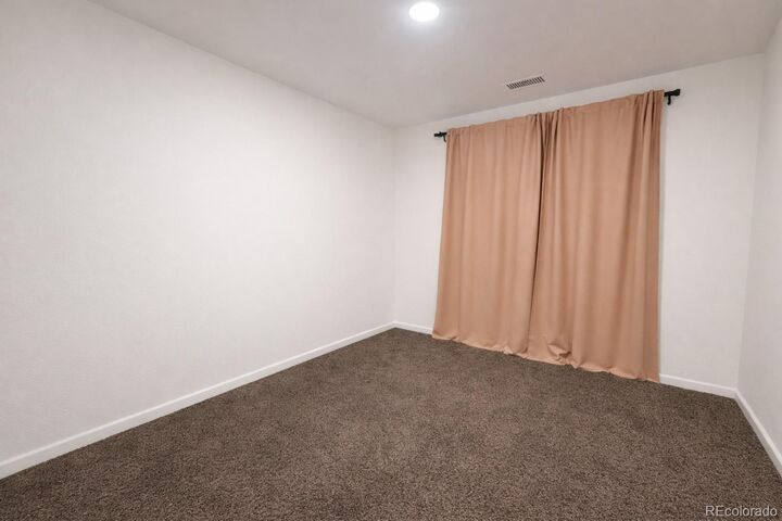 Property Photo: 8475 E 36th Avenue 316 CO 80238